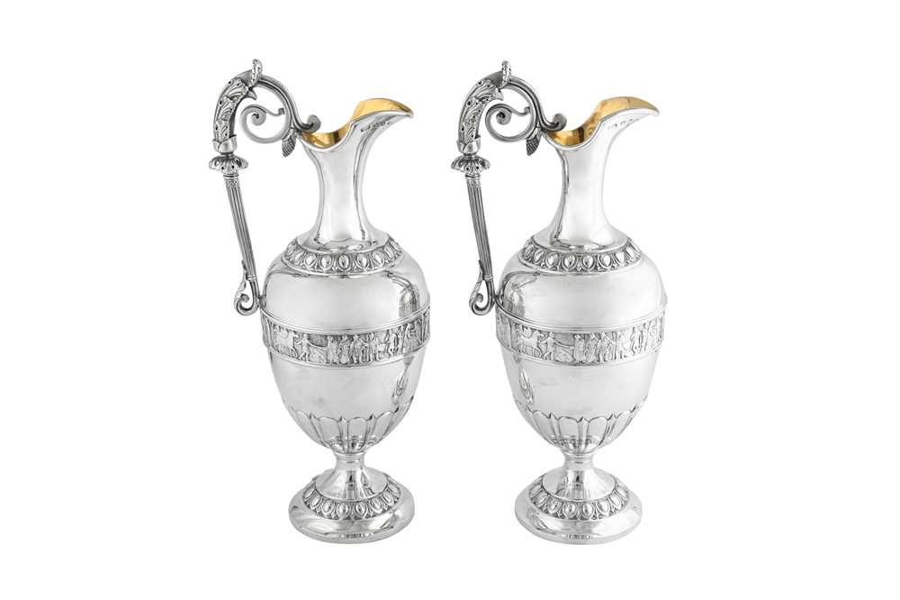 Lot 537 - A pair of Victorian sterling silver wine ewers or claret jugs, Birmingham 1891 by Elkington and Co