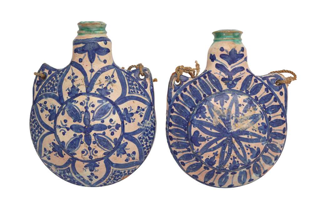 Lot 763 - TWO MOROCCAN BLUE AND WHITE POTTERY PILGRIM FLASKS