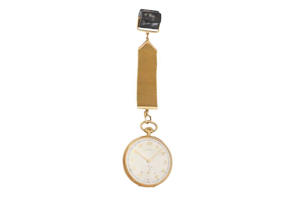 Lot 74 - AN OLMA OPEN FACE 14K YELLOW GOLD POCKET WATCH WITH A HARDSTONE SEAL FOB