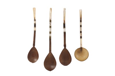 Lot 706 - λ FOUR CARVED WOOD, MOTHER-OF-PEARL, BONE, AND HORN SHERBET SPOONS