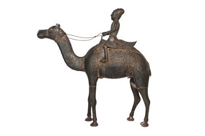 Lot 586 - AN INDIAN LOW-GRADE SILVER FIGURE OF A CAMEL AND ITS RIDER