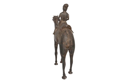 Lot 586 - AN INDIAN LOW-GRADE SILVER FIGURE OF A CAMEL AND ITS RIDER