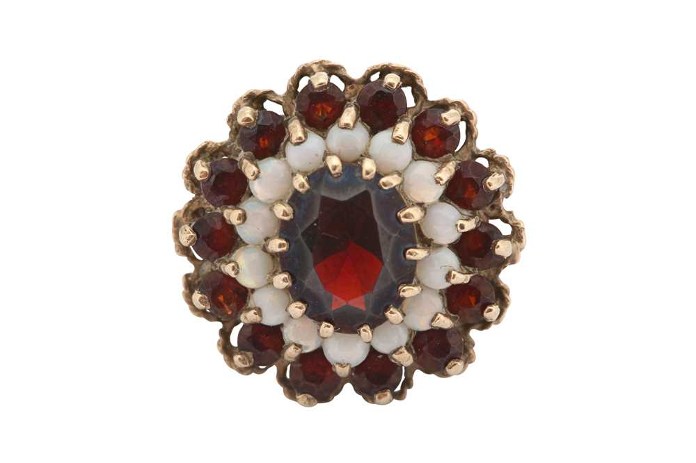 Lot 8 - A garnet and opal cluster ring