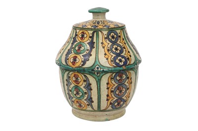 Lot 796 - A TUNISIAN CHEMLA POTTERY JAR WITH COVER