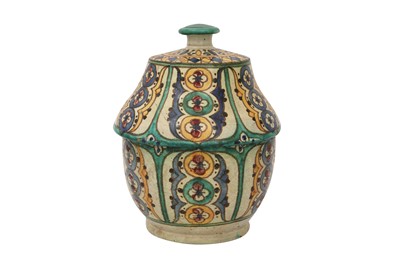 Lot 796 - A TUNISIAN CHEMLA POTTERY JAR WITH COVER