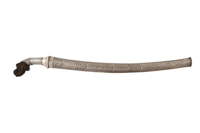 Lot 832 - A PEDANG BENGKOK SWORD WITH CARVED BUFFALO HORN HILT AND CHASED SILVER SCABBARD