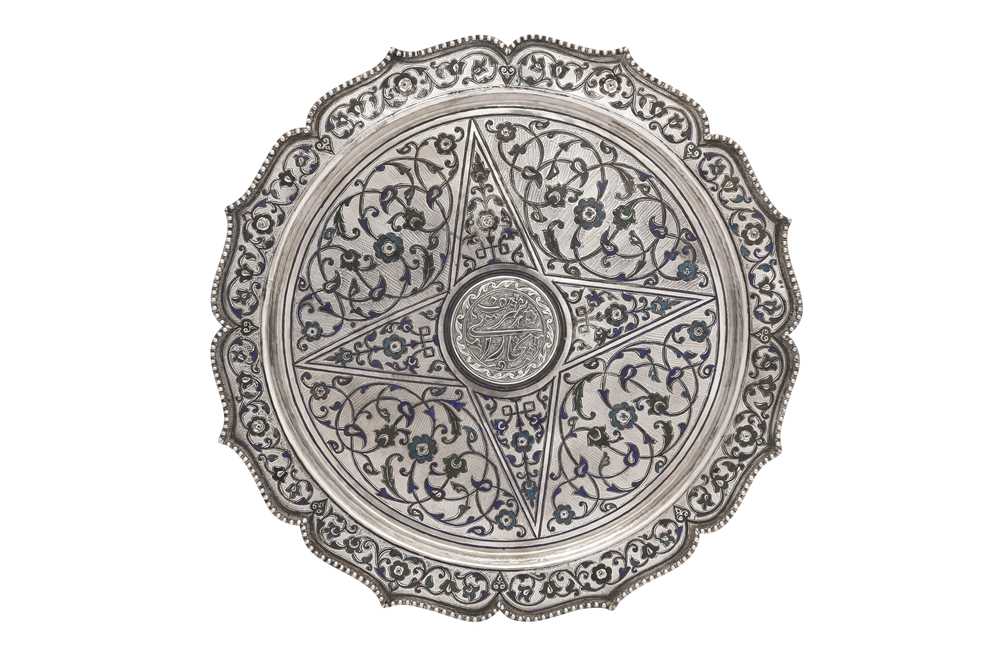 Lot 635 - A CENTRAL ASIAN ENAMELLED AND NIELLOED SILVER TRAY