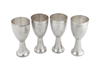 Lot 148 - Four late 20th century modern Indian silver goblets