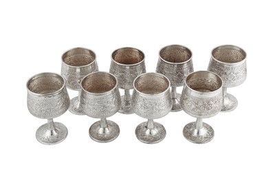 Lot 158 - A set of eight late 20th century modern Indian silver goblets