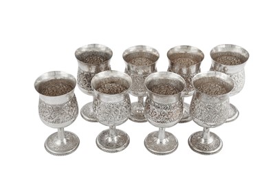 Lot 159 - A set of eight late 20th century modern Indian silver goblets