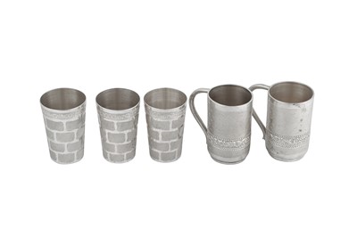 Lot 145 - A pair of 20th century modern Indian silver mugs