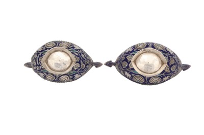 Lot 636 - A PAIR OF SILVER REPOUSSÉ AND ENAMELLED BEGGAR'S BOWLS (KASHKUL)