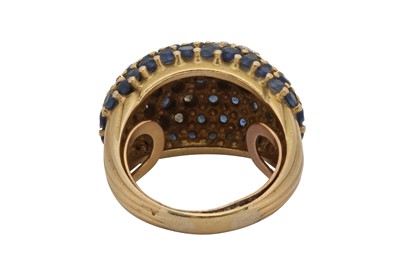Lot 71 - A sapphire and diamond bombé ring