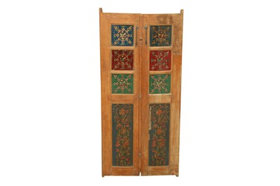 Lot 593 - A SET OF IRANIAN STAINED GLASS AND POLYCHROME-LACQUERED DOOR PANELS