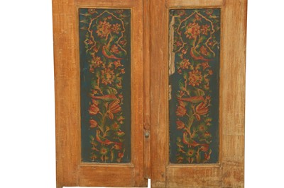 Lot 593 - A SET OF IRANIAN STAINED GLASS AND POLYCHROME-LACQUERED DOOR PANELS