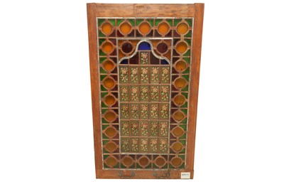 Lot 616 - A PAIR OF IRANIAN STAINED GLASS WINDOW SHUTTERS IN WOODEN FRAMES