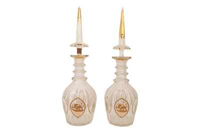 Lot 604 - A PAIR OF GILT AND POLYCHROME-PAINTED BOHEMIA CLEAR CRYSTAL GLASS SPIRIT DECANTERS