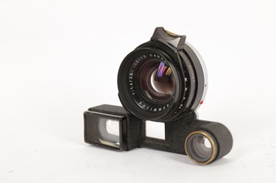 Lot 114 - A Leitz 35mm f/1.4 Summilux with Ocular Attachment (M3)