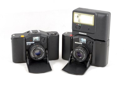 Lot 565 - Minox 35 EL & GT Compact Cameras.