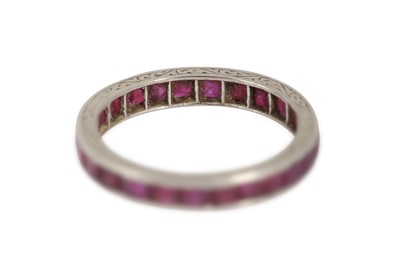 Lot 83 - A ruby eternity ring