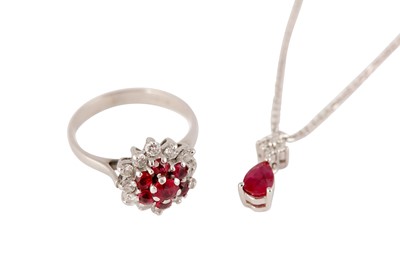 Lot 45 - A RUBY AND DIAMOND PENDANT AND RING SUITE