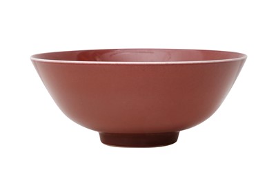 Lot 254 - A CHINESE COPPER RED-GLAZED BOWL.