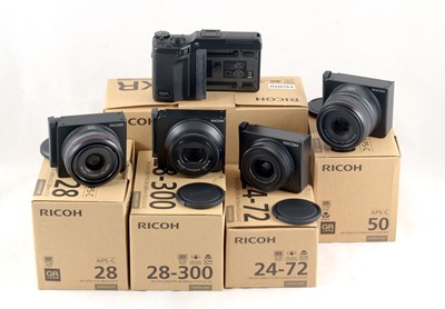 Lot 452 - Extensive 4-Lens Ricoh GXR Digital Camera Outfit.