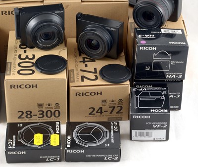 Lot 452 - Extensive 4-Lens Ricoh GXR Digital Camera Outfit.
