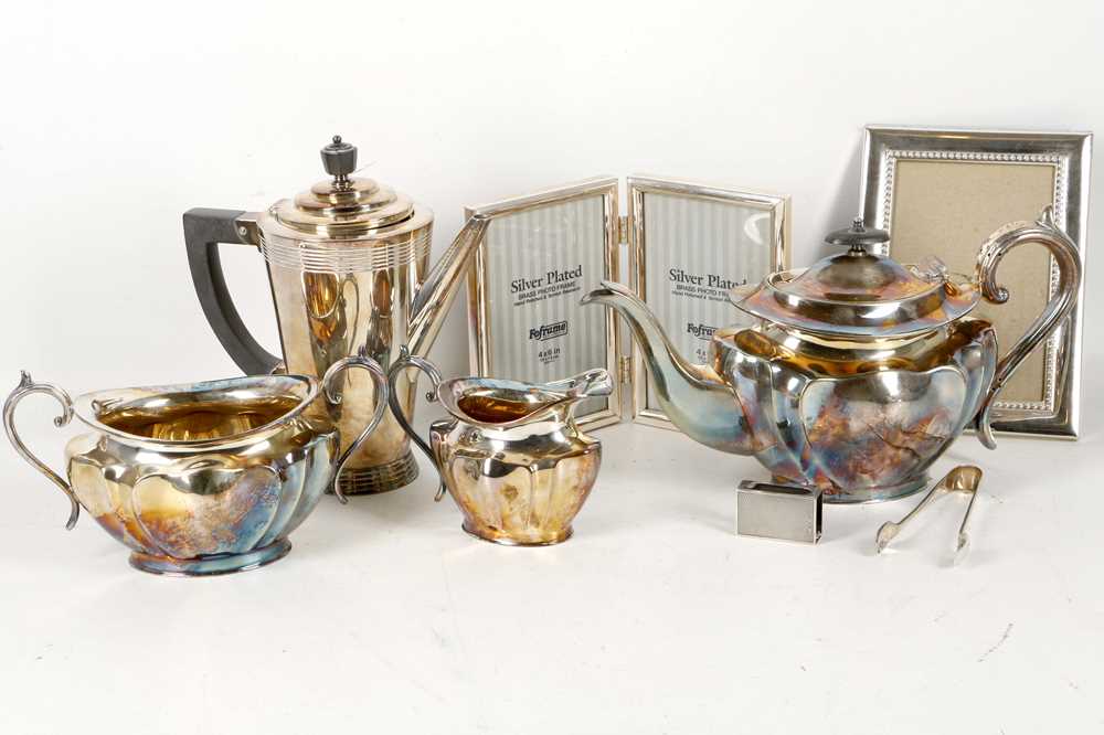 Lot 241 - A collection of silver plate items to include,...