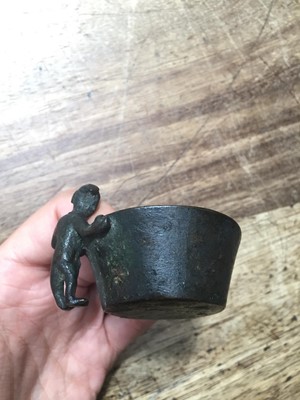 Lot 295 - A CHINESE BRONZE 'BOY' CUP.