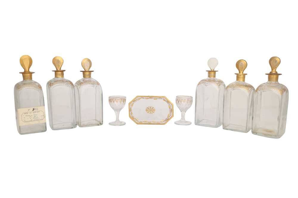 Lot 512 - A PORTABLE DRINKING SET WITH GILT GLASS DECANTERS AND SPIRIT GLASSES