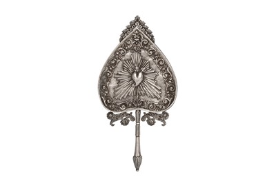 Lot 774 - AN OTTOMAN SILVER MIRROR WITH THE CHRISTIAN SYMBOL OF THE SACRED HEART