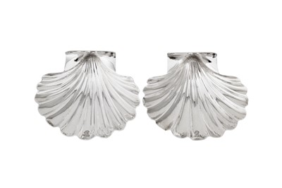 Lot 630 - A rare pair of George II Irish sterling silver butter shells, Dublin circa 1740 by John Hamilton