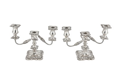 Lot 105 - A PAIR OF ELIZABETH II STERLING SILVER THREE-LIGHT CANDLEABRA, SHEFFIELD 1965 BY E VINER