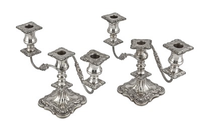 Lot 105 - A PAIR OF ELIZABETH II STERLING SILVER THREE-LIGHT CANDLEABRA, SHEFFIELD 1965 BY E VINER