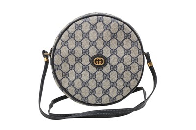 Lot 132 - Gucci Blue Supreme Monogram Round Crossbody Bag