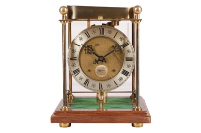 Lot 306 - A THWAITES & REED ROLLING BALL CLOCK