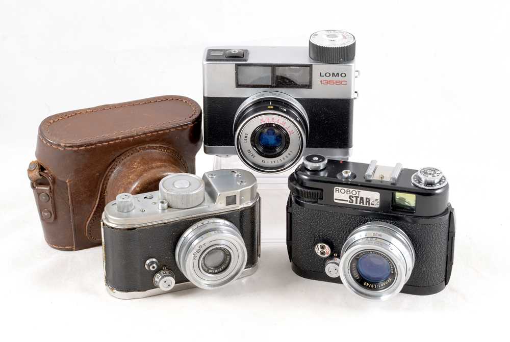 Lot 574 - Robot & Lomo Clockwork Drive Cameras.