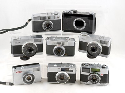 Lot 520 - A Good Group of 8 Half Frame Cameras.