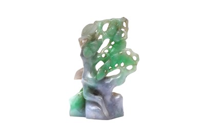 Lot 314 - A CHINESE APPLE-GREEN JADEITE CARVING OF A PINE TREE
