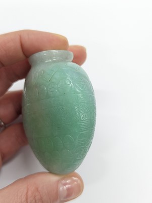 Lot 464 - A CHINESE APPLE-GREEN JADEITE SNUFF BOTTLE, STOPPER AND STAND