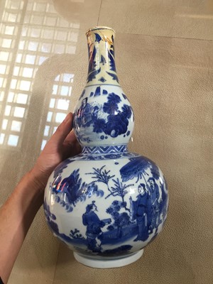 Lot 267 - A CHINESE BLUE AND WHITE 'FIGURAL' DOUBLE GOURD VASE