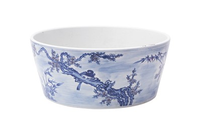 Lot 371 - A LARGE CHINESE BLUE AND WHITE AND UNDERGLAZE RED 'BIRDS' JARDINIERE.