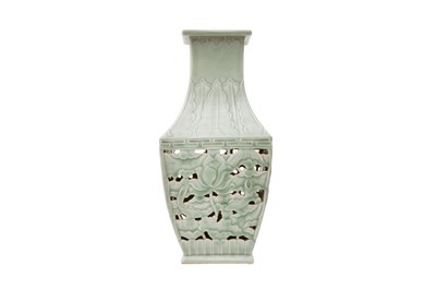 Lot 70 - A CHINESE CELADON-GLAZED RETICULATED 'LOTUS POND' VASE.