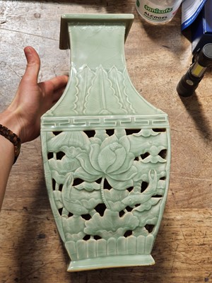 Lot 70 - A CHINESE CELADON-GLAZED RETICULATED 'LOTUS POND' VASE.
