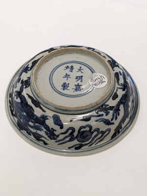 Lot 430 - A CHINESE BLUE AND WHITE 'DRAGON' DISH.