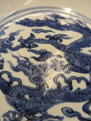 Lot 430 - A CHINESE BLUE AND WHITE 'DRAGON' DISH.