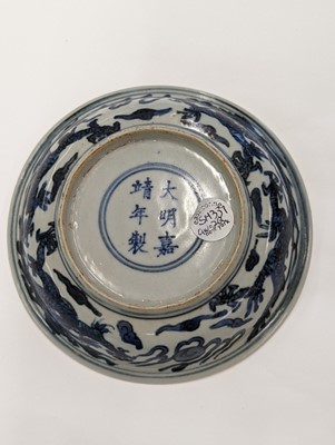 Lot 430 - A CHINESE BLUE AND WHITE 'DRAGON' DISH.