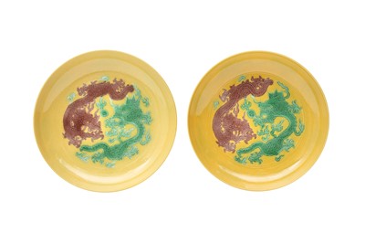 Lot 174 - A PAIR OF CHINESE YELLOW-GROUND 'DRAGON' SAUCER DISHES.