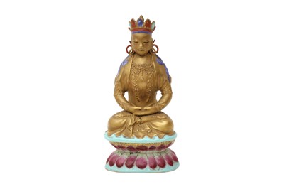 Lot 384 - A CHINESE FAMILLE ROSE FIGURE OF A BODHISATTVA.